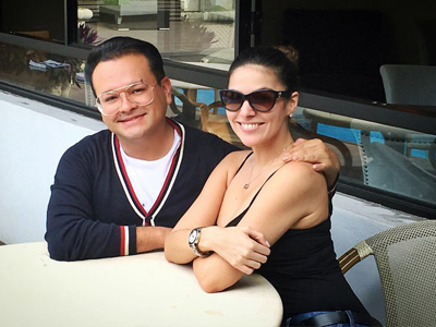 Picture of a happy couple, looking directly at the camera and smiling, and enjoying their stay at the Costa Rica Medical Center Inn, San Jose, Costa Rica.