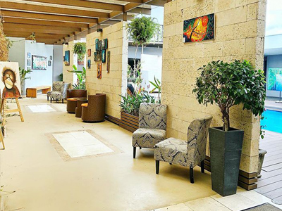 9-	Picture of the beautiful interior at the Costa Rica Medical Center Inn, San Jose, Costa Rica.  The pool is also shown in the picture.